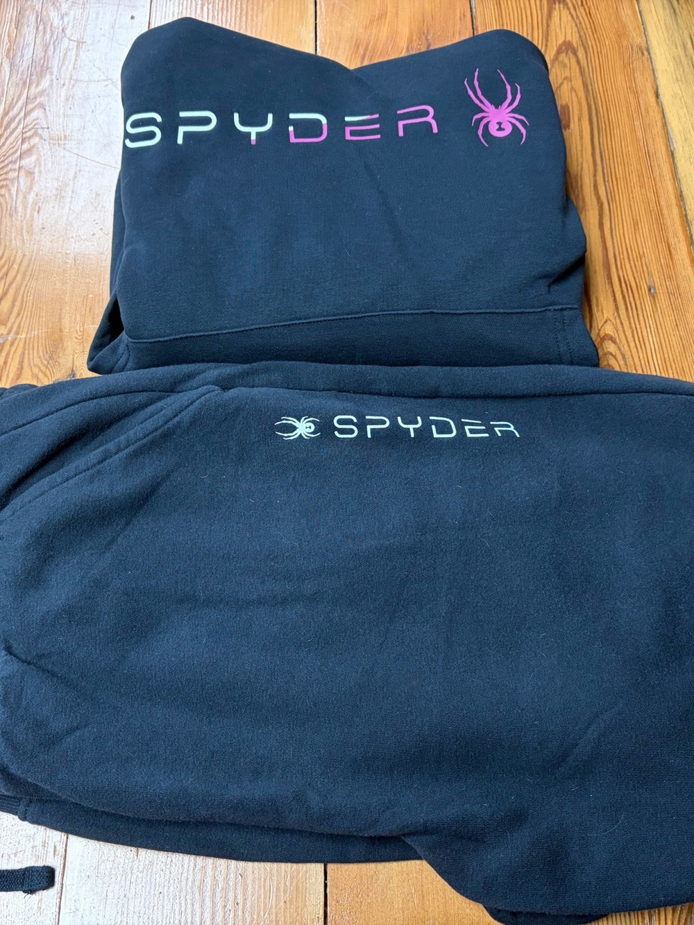 Spyder women’s black hoodie and sweatpants with spider logo L & XL